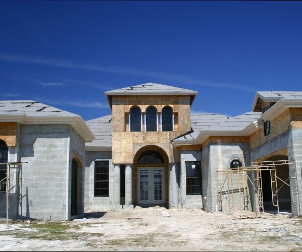 home construction is shown with wood and concrete