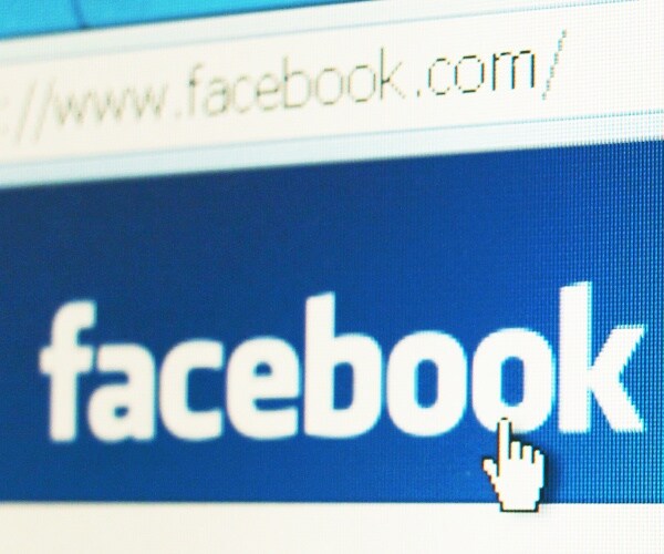 facebook website and logo with mouse on it