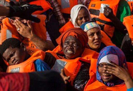 The Latest: Spain Rescues 63 Migrants near Southern Coast
