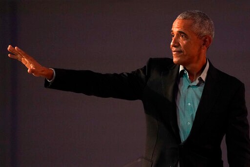 The Latest: Obama: US Needs Unity to Fight Climate Change