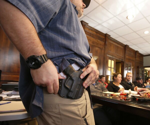 Dem. Gov., GOP Lawmakers Make Deal on Gun Control in Virginia