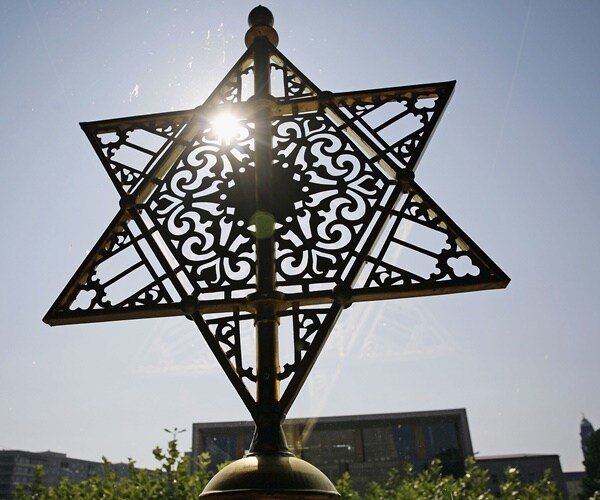 a starof david is atop synogogue