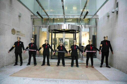 Climate Activists Block Entrance to London Stock Exchange