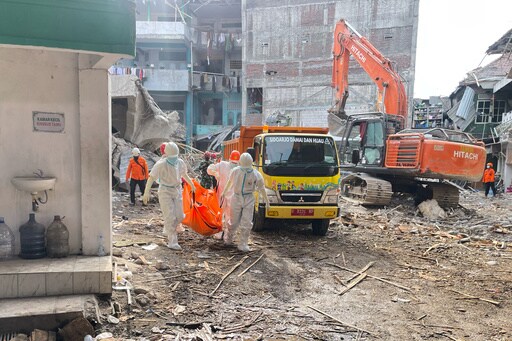 Indonesian Rescuers Search for Missing Students after School Collapse Kills 40