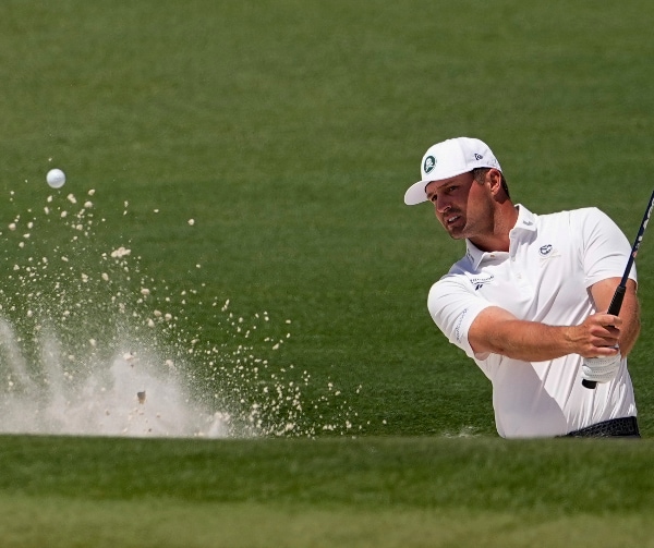 Bryson DeChambeau swings a golf club