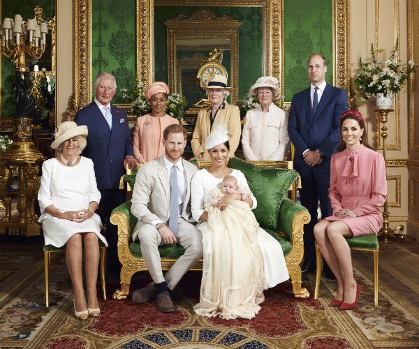 members of the royal family surround baby archie for an official portrait
