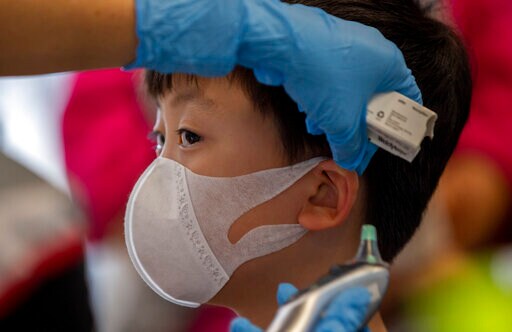 Thai Holiday Over, Chinese Visitors Fly Home to Wuhan