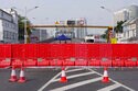 China Tightens Restrictions as Rise in Virus Cases Reported