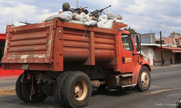 Vigilantes, Drug Cartels Fight Heated Battle in Western Mexico