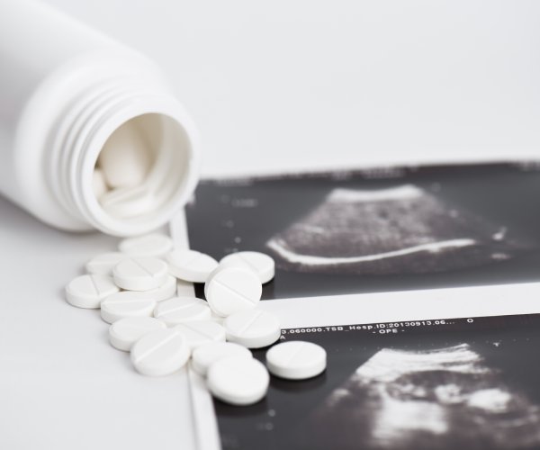 abortion pills poured out