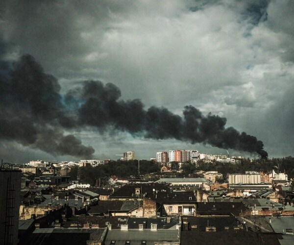 Smoke rises on the horizon 