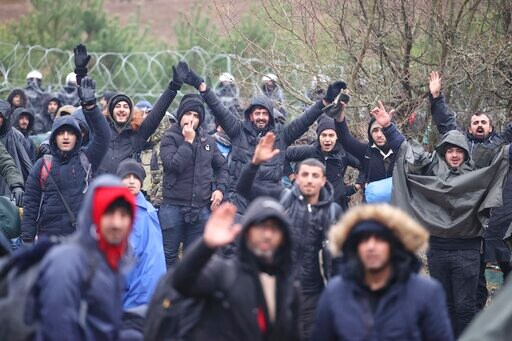 Poland Ups Security as Migrants Mass on Border with Belarus