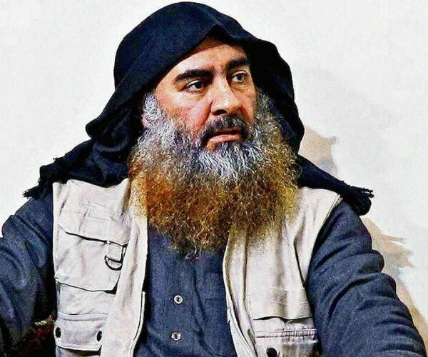 Abu Bakr al-Baghdadi is shown with a full gray and reddish beard