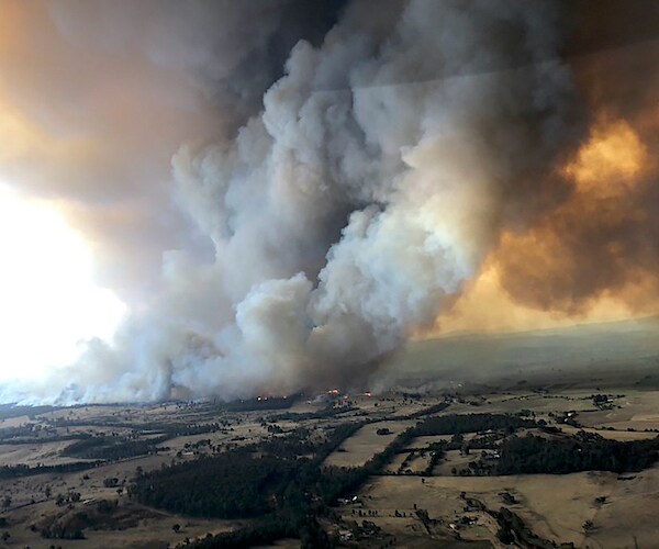 the wild fire rages high in the sky in australia