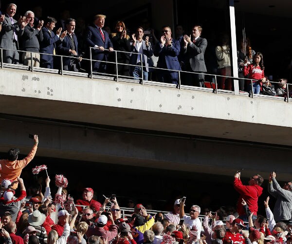 Trump Soaks in Deep South Cheers at College Football Matchup