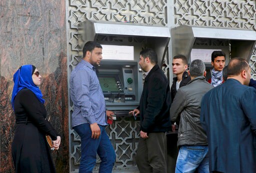 Palestinian Government Slashes Salaries for Gaza Employees