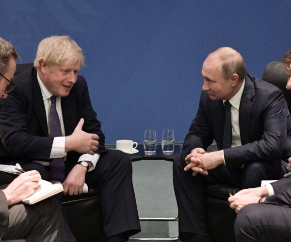 Boris Johnson and Vladimir Putin speaking 