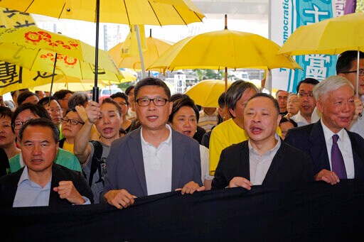 The Latest: Hong Kong Protest Organizers Sentenced