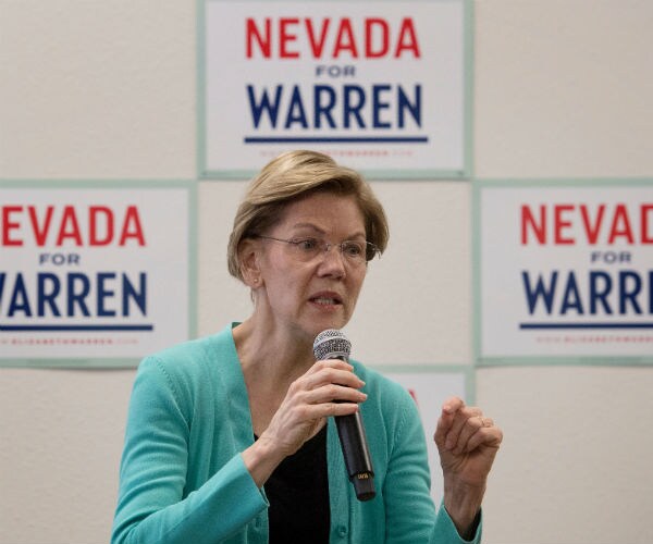 sen. elizabeth warren is shown speaking to supporters in las vegas.