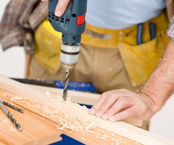 drilling into a piece of wood