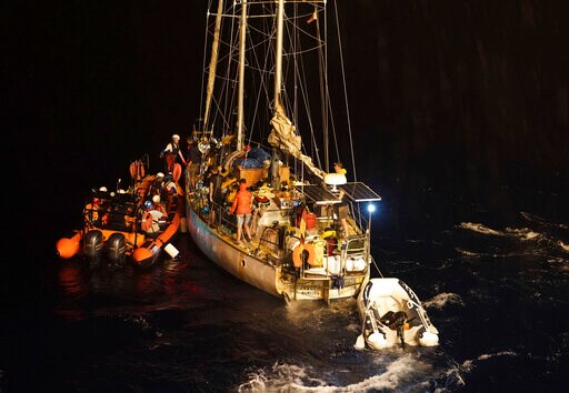 The Latest: Greece Arrests 2 for Migrant Smuggling