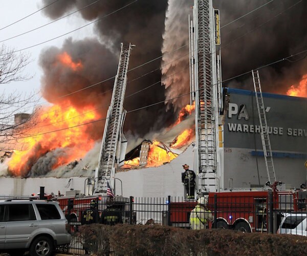 Firefighters Battle Massive Blaze in St. Louis Warehouse