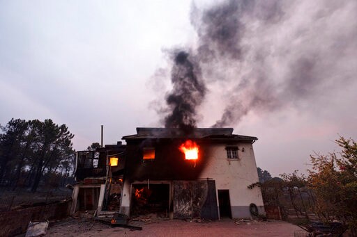 40 Die in Fires in Portugal, Spain; Rain Helps Firefighters