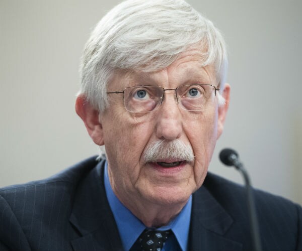francis collins is shown at a hearing