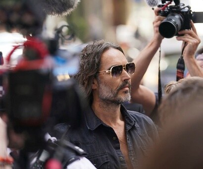 Actor-comedian Russell Brand was granted conditional bail by a London court on Friday after appearin...