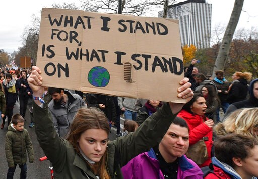 The Latest: World Bank Ups Climate Funding to $200 Billion