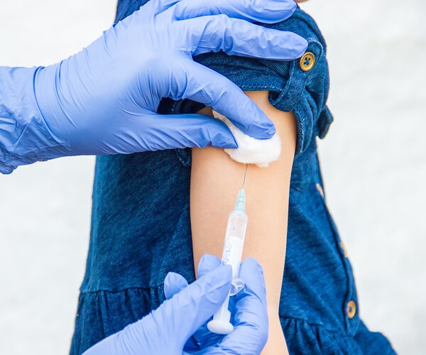 a child being vaccinated