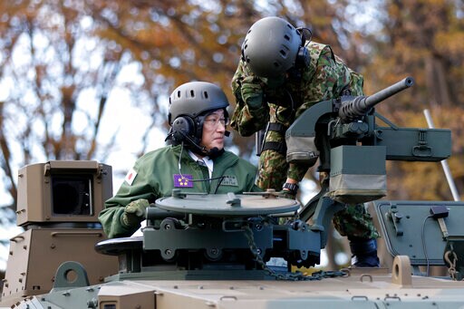 Japan Cabinet OKs Record Defense Budget amid Taiwan Concerns