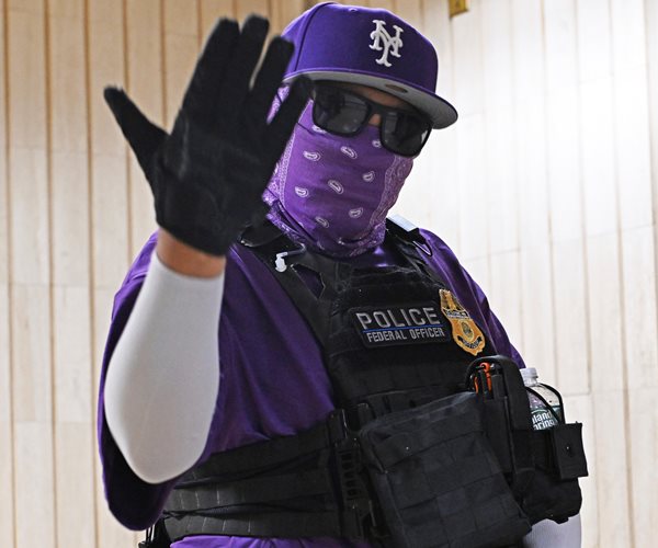 New York City office buildings are taking steps to increase security following the midtown shooting ...