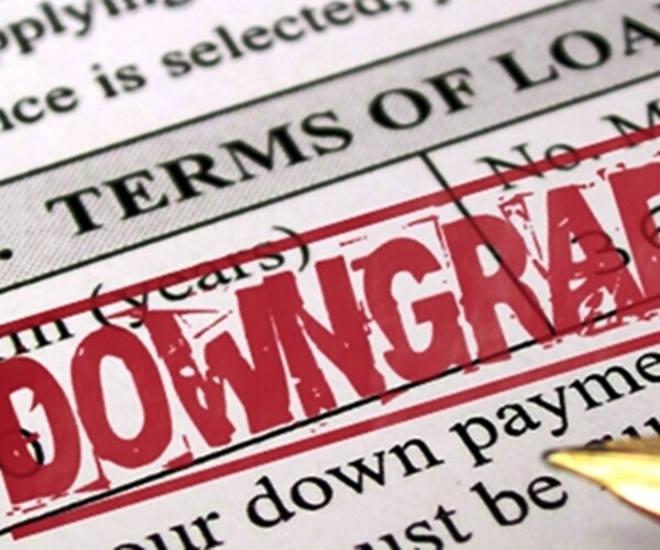 S&P, Moody's Cut Credit Grades at Fastest Pace In a Decade