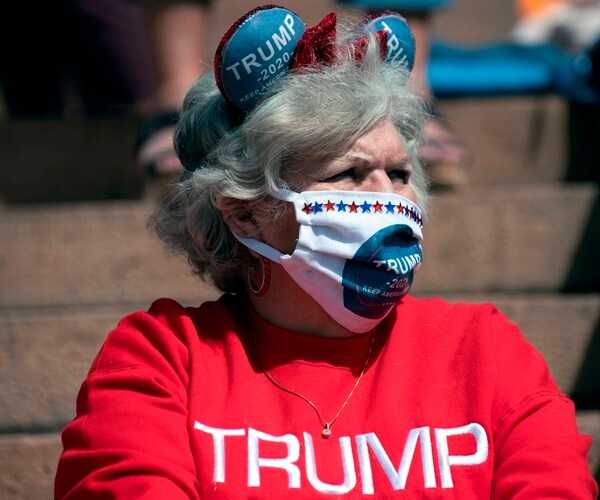 a trump supporter at an open the state rally