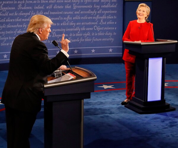 hillary clinton laughs at donald trump during a 2016 presidential debate