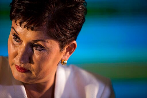 Facing Arrest Warrant, Candidate Delays Return to Guatemala