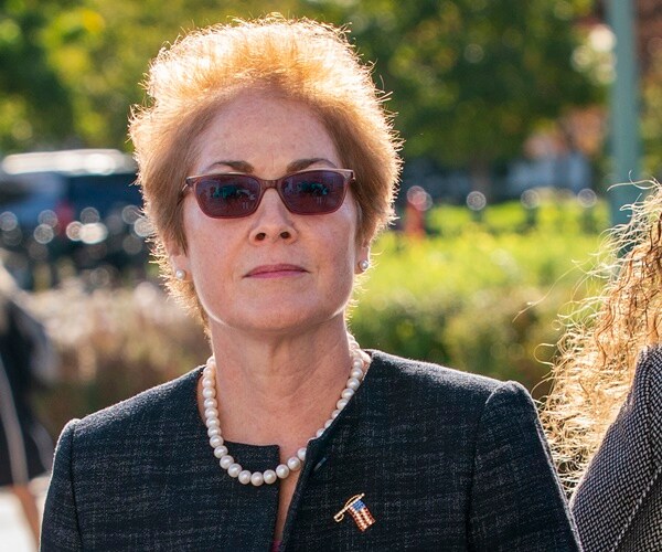 marie yovanovitch walk to congress to testify.