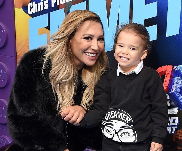 naya rivera and son josey pose for photo on blue carpet