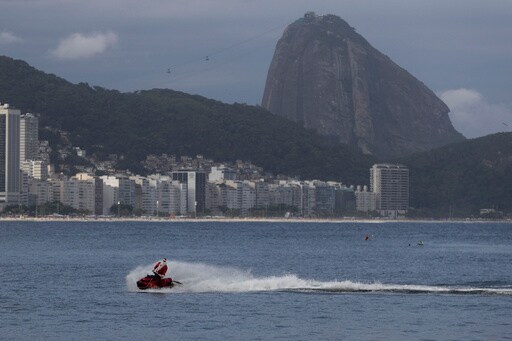 Brazilian Santa Swaps Sleigh for Jet Ski to Deliver Toys — and Joy — to Disabled Children in Rio