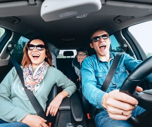 family singing in car