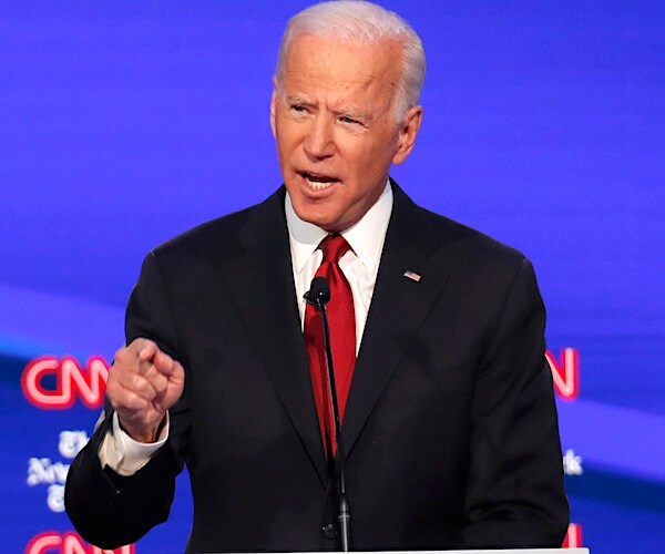 joe biden points and speaks during a democratic presidential primary debate