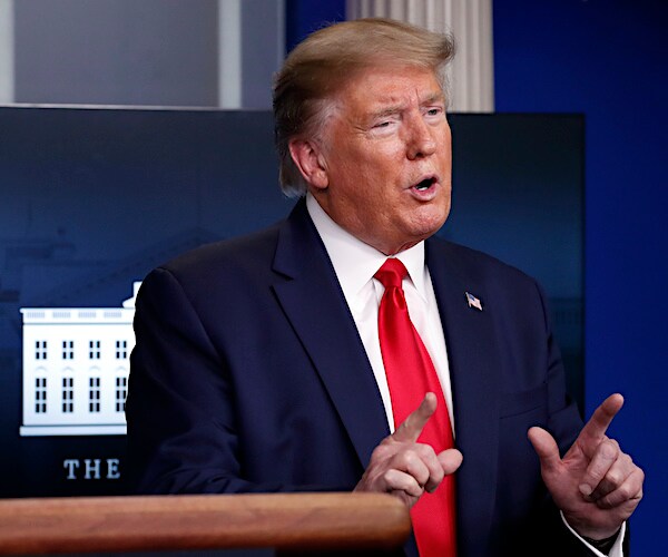 president donald trump gestures during the daily coronavirus task force briefing