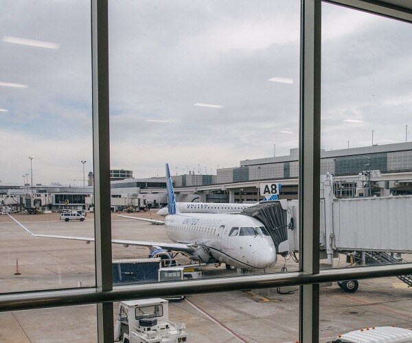 united plane sits at gate