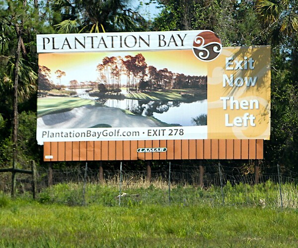 a road sign of plantation bay in daytona florida