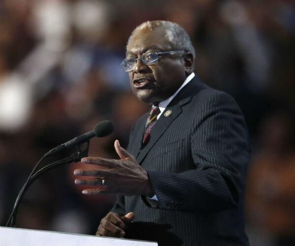rep. james clyburn is seen speaking at a podium