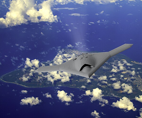 a drone flies over the pacific island of guam