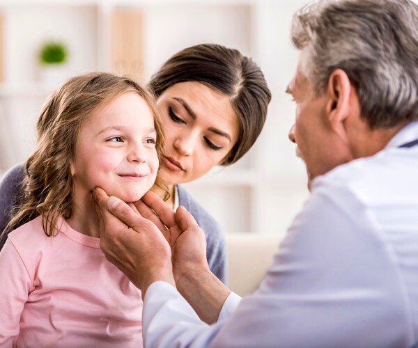 A young child visiting the doctor