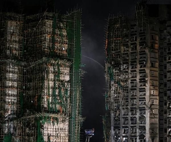 Hong Kong Police Arrest Construction Firm Bosses over Fire; Death Toll Hits 83, Scores Missing