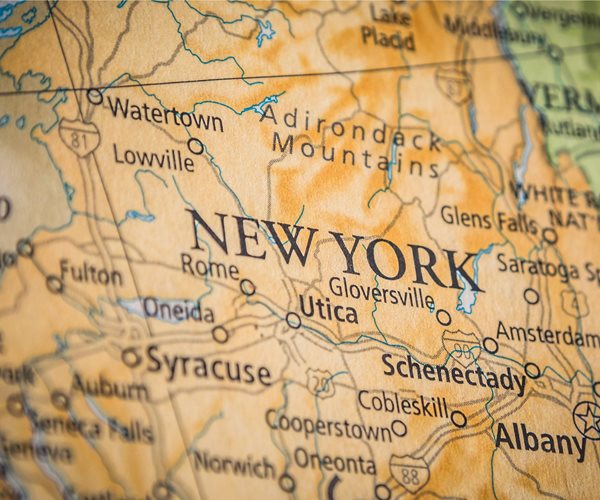
Closeup Selective Focus Of New York State On A Geographical And Political State Map Of The USA
